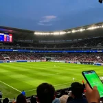 Live betting on trực tiếp bóng đá with expert predictions and match odds displayed in a vibrant stadium atmosphere.